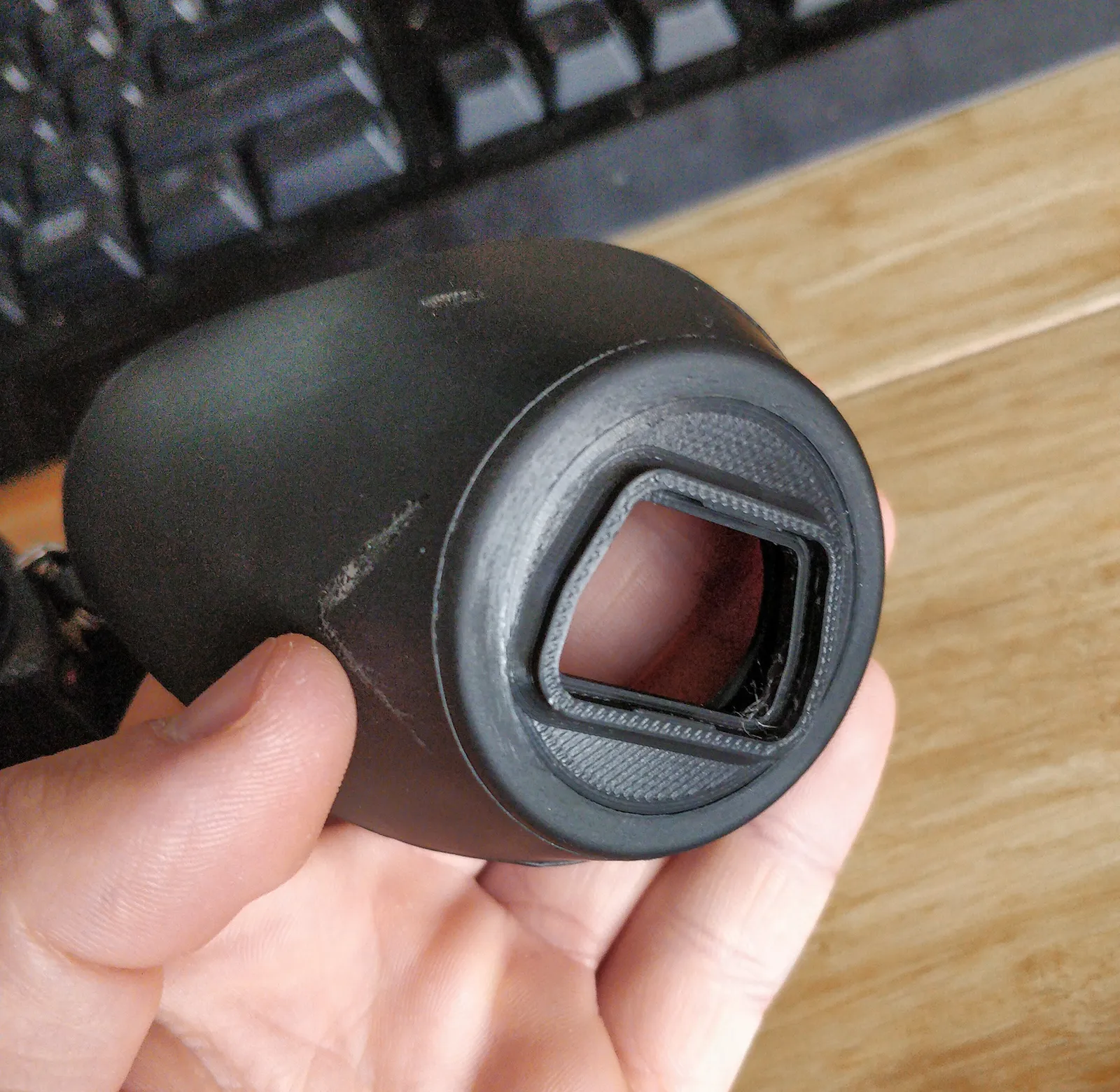The 3D-Printed adapter in the flexible eyepiece.