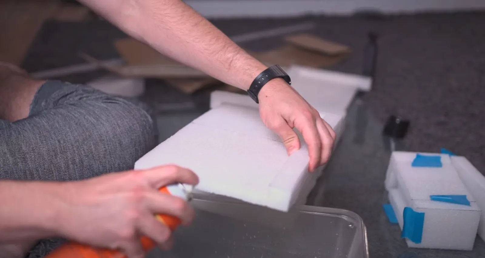 Building the body with spray adhesive and packing foam